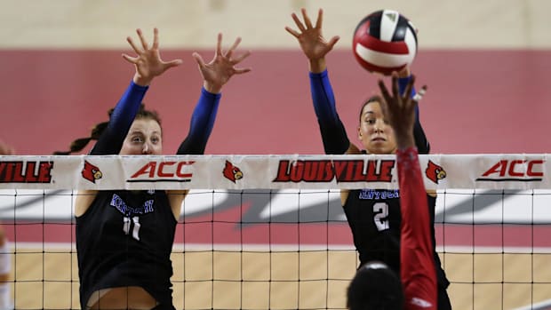 Elise Goetzinger blocks against Louisville. 