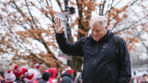 Nov 23, 2024; Columbus, Ohio, USA; Ohio State Buckeyes offensive coordinator Chip Kelly waves to fans before the game against