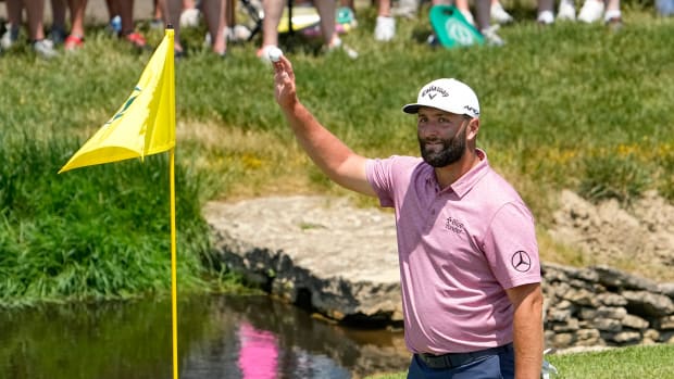 Jon Rahm waves to the crowd as he celebrates an eagle during the final round of the Memorial Tournament at Muirfield Village.