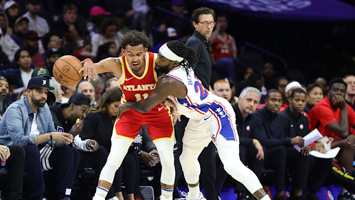Patrick Beverley using his signature "hands-on" defense on Trae Young