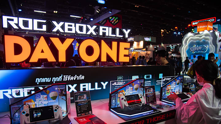 A visitor seen inspect a ROG Xbox Ally during the Thailand...