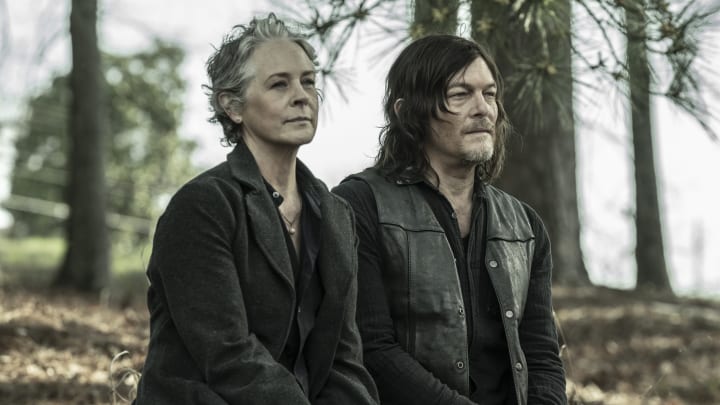 Norman Reedus as Daryl Dixon, Melissa McBride as Carol Peletier - The Walking Dead _ Season 11, Episode 24 - Photo Credit: Jace Downs/AMC