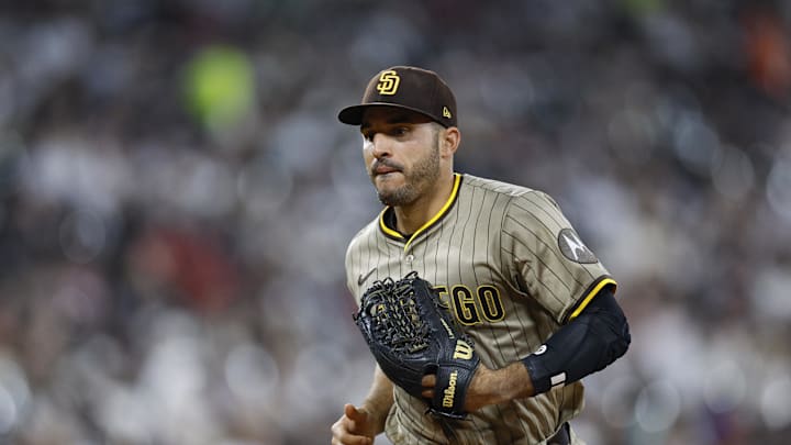 Sep 19, 2025; Chicago, Illinois, USA; San Diego Padres left fielder Ramon Laureano (5) returns to the dugout after the seventh inning of a baseball game against the Chicago White Sox at Rate Field. Mandatory Credit: Kamil Krzaczynski-Imagn Images