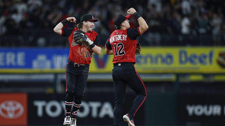 Sep 19, 2025; Chicago, Illinois, USA; Chicago White Sox second baseman Chase Meidroth (10) and shortstop Colson Montgomery (12) celebrate team's win against the San Diego Padres at Rate Field. Mandatory Credit: Kamil Krzaczynski-Imagn Images