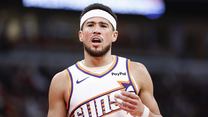 Apr 5, 2026; Chicago, Illinois, USA; Phoenix Suns guard Devin Booker (1) reacts during the second half at United Center. Mandatory Credit: Kamil Krzaczynski-Imagn Images