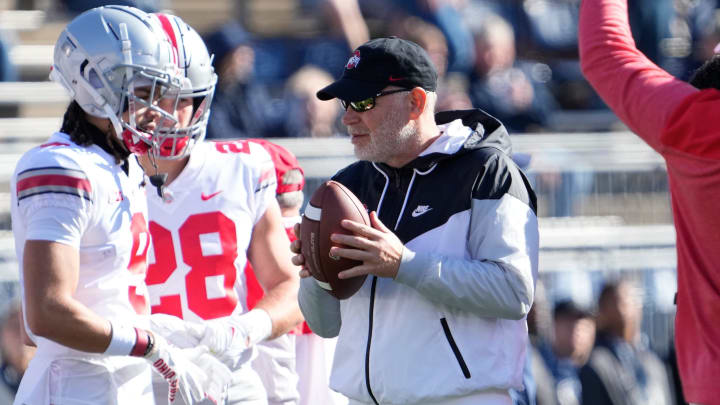 Ohio State defensive coordinator Jim Knowles watches warmups prior to a game against Penn State.