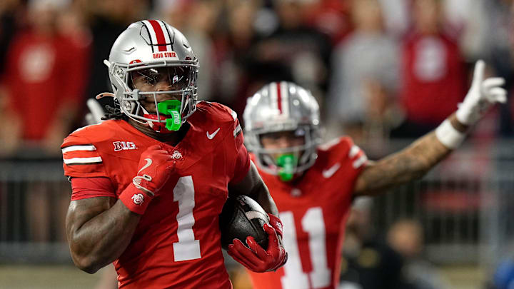 Sep 7, 2024; Columbus, Ohio, USA; Ohio State Buckeyes running back Quinshon Judkins (1) runs for a touchdown that was called back on a holding penalty during the first half of the NCAA football game against the Western Michigan Broncos at Ohio Stadium.