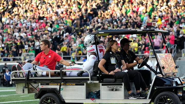 Oct 12, 2024; Eugene, Oregon, USA; Ohio State Buckeyes left tackle Josh Simmons is carted off the field during the first half of the NCAA football game against the Oregon Ducks at Autzen Stadium