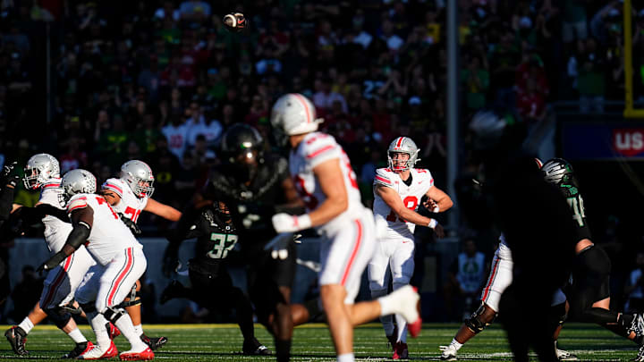 Oct 12, 2024; Eugene, Oregon, USA; Ohio State Buckeyes quarterback Will Howard (18) throws a pass during the first half of the NCAA football game against the Oregon Ducks at Autzen Stadium