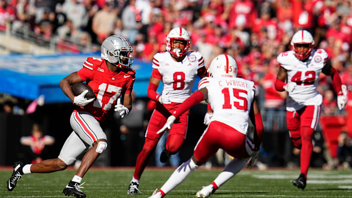 Ohio State Buckeyes wide receiver Carnell Tate (17) runs toward Nebraska Cornhuskers defensive back Ceyair Wright (15) after making a catch during the second half of the NCAA football game at Ohio Stadium in Columbus on Saturday, Oct. 26, 2024. Ohio State won 21-17.