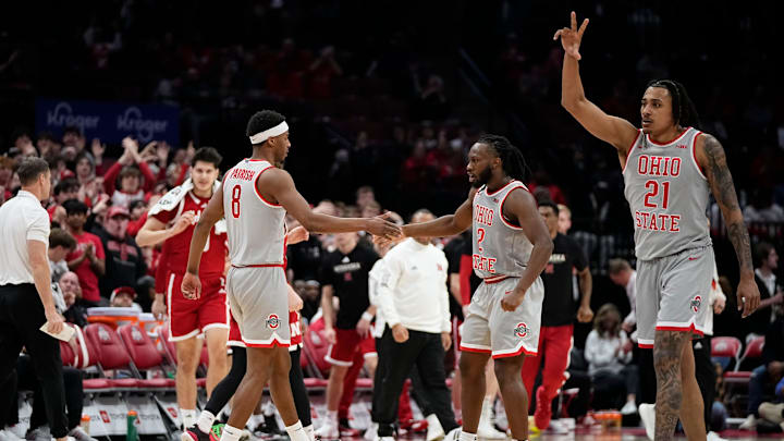 Ohio State Buckeyes guard Micah Parrish (8) celebrates a three pointer with guard Bruce Thornton (2) and forward Devin Royal (21) during the second half of the NCAA men's basketball game against the Nebraska Cornhuskers at Value City Arena in Columbus on March 4, 2025. Ohio State won 116-114.