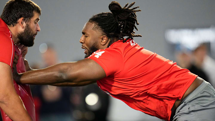 Ohio State Buckeyes offensive lineman Donovan Jackson (74) pushes offensive lineman Josh Fryar while running a drill during the pro day for NFL scouts at the Woody Hayes Athletic Cente on March 26, 2025.