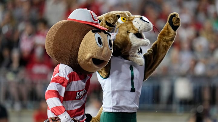Ohio State Buckeyes mascot Brutus and Ohio Bobcats mascot Rufus interact during the first half of the NCAA football game at Ohio Stadium on Sept. 13, 2025.