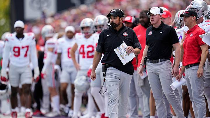 Ohio State Buckeyes head coach Ryan Day watches during the first half of the NCAA football game against the Washington Huskies at Husky Stadium in Seattle on Sept. 27, 2025.