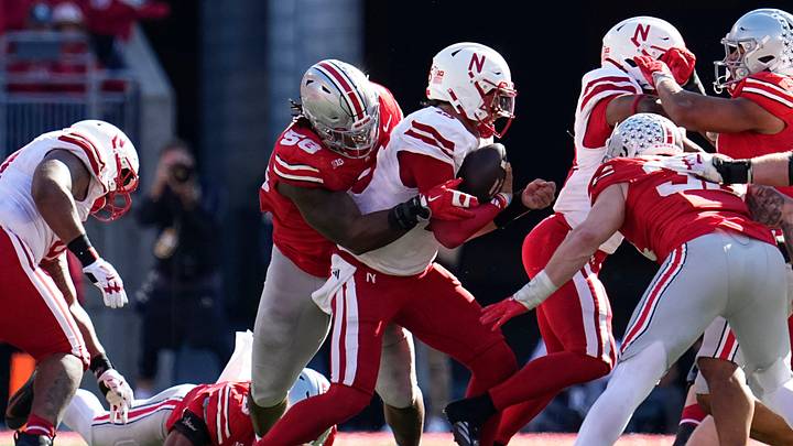 Ohio State Buckeyes defensive tackle Ty Hamilton (58) tackles Nebraska Cornhuskers quarterback Dylan Raiola (15) during the second half of the NCAA football game at Ohio Stadium in Columbus on Saturday, Oct. 26, 2024. Ohio State won 21-17.