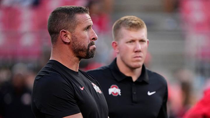 Ohio State Buckeyes offensive coordinator Brian Hartline and co-offensive coordinator Keenan Bailey watch warm ups prior to the NCAA football game against the Minnesota Golden Gophers at Ohio Stadium in Columbus on Oct. 4, 2025. Ohio State won 42-3.