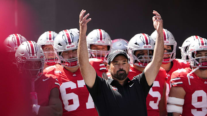 Ohio State Buckeyes head coach Ryan Day leads his team onto the field prior to the NCAA football game against the Texas Longhorns at Ohio Stadium on Aug. 30, 2025.