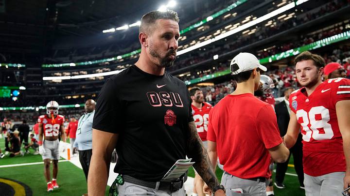 Ohio State Buckeyes offensive coordinator Brian Hartline leaves the field following the Cotton Bowl at AT&T Stadium in Arlington, Texas for the College Football Playoff quarterfinal game against the Miami Hurricanes on Dec. 31, 2025. Ohio State lost 24-14.