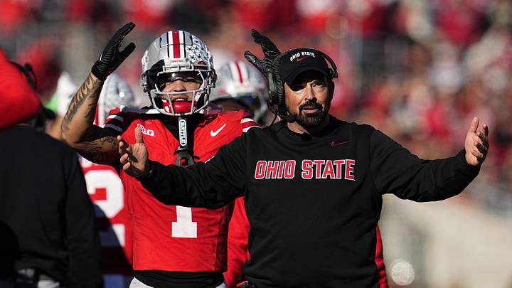 Ohio State Buckeyes head coach Ryan Day and wide receiver Brandon Inniss (1) react during the second half of the NCAA football game against the Rutgers Scarlet Knights at Ohio Stadium in Columbus on Nov. 22, 2025. Ohio State won 42-9.