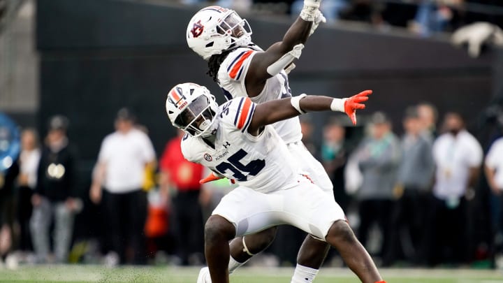 Auburn linebacker Jalen McLeod (35) celebrates sacking Vanderbilt quarterback Ken Seals (8) during the third quarter at FirstBank Stadium in Nashville, Tenn., Saturday, Nov. 4, 2023.