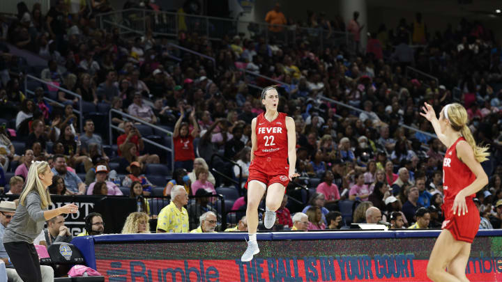 Aug 30, 2024; Chicago, Illinois, USA; Indiana Fever guard Caitlin Clark (22) celebrates after scoring against the Chicago Sky during the second half at Wintrust Arena. Mandatory Credit: Kamil Krzaczynski-USA TODAY Sports