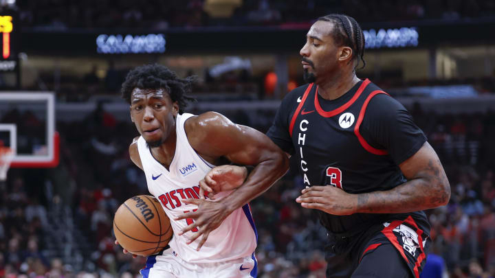 Feb 27, 2024; Chicago, Illinois, USA; Detroit Pistons center James Wiseman (13) drives to the basket against Chicago Bulls center Andre Drummond (3) during the first half at United Center. Mandatory Credit: Kamil Krzaczynski-USA TODAY Sports