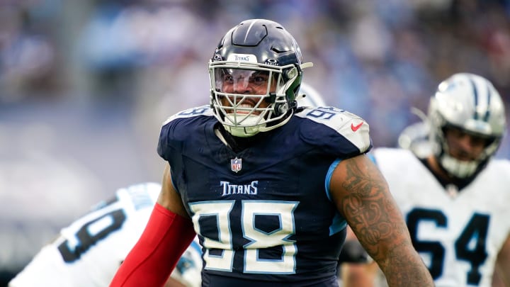 Tennessee Titans defensive tackle Jeffery Simmons (98) celebrates sacking Carolina Panthers quarterback Bryce Young during the third quarter at Nissan Stadium in Nashville, Tenn., Sunday, Nov. 26, 2023