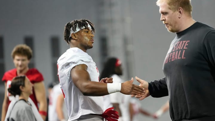 Mar 5, 2024; Columbus, OH, USA; Ohio State Buckeyes safety Caleb Downs (2) stretches during the first spring practice at the Woody Hayes Athletic Center.