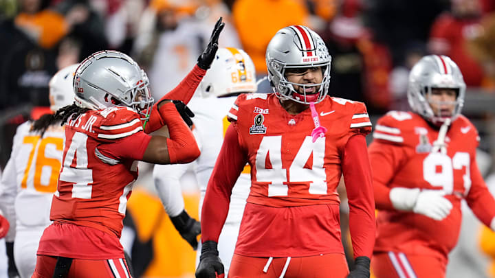 Ohio State Buckeyes defensive end JT Tuimoloau (44) celebrates a sack and forced fumble during the second half of the College Football Playoff first round game against the Tennessee Volunteers at Ohio Stadium in Columbus on Dec. 22, 2024. Ohio State won 42-17. Ohio State Buckeyes defensive end JT Tuimoloau (44) celebrates a sack and forced fumble during the second half of the College Football Playoff first round game against the Tennessee Volunteers at Ohio Stadium in Columbus on Dec. 22, 2024. Ohio State won 42-17.