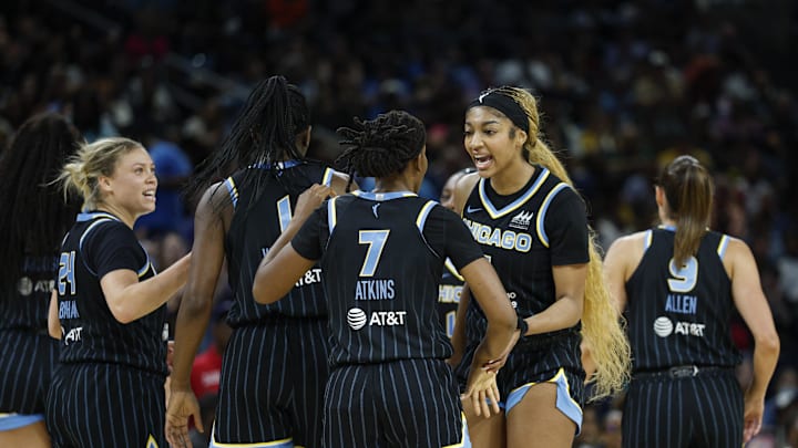Jul 12, 2025; Chicago, Illinois, USA; Chicago Sky forward Angel Reese (5) celebrates with her teammates during the first half of a WNBA game against the Minnesota Lynx at Wintrust Arena. Mandatory Credit: Kamil Krzaczynski-Imagn Images