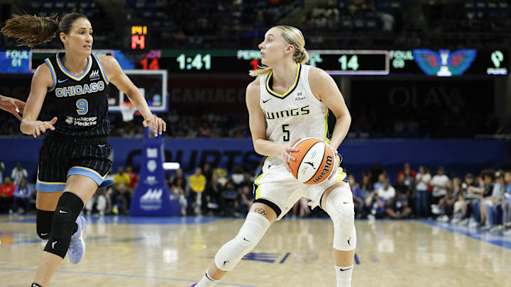 Dallas Wings guard Paige Bueckers looks to shoot against Chicago Sky guard Rebecca Allen.