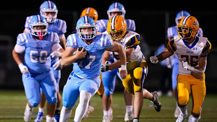Olentangy Berlin's Aiden Eviston (17) runs the ball against the Olentangy Braves in the first half at Olentangy Berlin High School on Oct 25, 2024 in Delaware, Ohio. Olentangy Berlin's Aiden Eviston (17) runs the ball against the Olentangy Braves in the first half at Olentangy Berlin High School on Oct 25, 2024 in Delaware, Ohio.