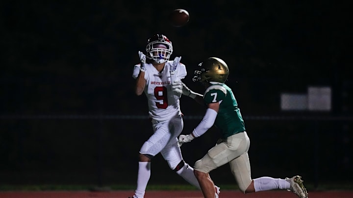 Aug 18, 2023; Dublin, Ohio, USA; Westerville South Wildcats DB/WR Isaac Patterson (9) catches a touchdown pass over Dublin Jerome Celtics defensive back Nick Hughes (7) during the second half of the high school football game at Dublin Jerome High School. Jerome won 30-15. Aug 18, 2023; Dublin, Ohio, USA; Westerville South Wildcats DB/WR Isaac Patterson (9) catches a touchdown pass over Dublin Jerome Celtics defensive back Nick Hughes (7) during the second half of the high school football game at Dublin Jerome High School. Jerome won 30-15.