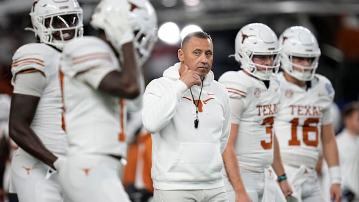 Texas Longhorns head coach Steve Sarkisian leads warm ups prior to the Cotton Bowl Classic College Football Playoff semifinal game between the Ohio State Buckeyes and the Texas Longhorns at AT&T Stadium in Arlington, Texas on Jan. 10, 2025. Texas Longhorns head coach Steve Sarkisian leads warm ups prior to the Cotton Bowl Classic College Football Playoff semifinal game between the Ohio State Buckeyes and the Texas Longhorns at AT&T Stadium in Arlington, Texas on Jan. 10, 2025.