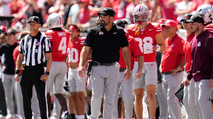 Ohio State Buckeyes head coach Ryan Day watches from the sideline during the first half of the NCAA football game against the Texas Longhorns at Ohio Stadium on Aug. 30, 2025. Ohio State Buckeyes head coach Ryan Day watches from the sideline during the first half of the NCAA football game against the Texas Longhorns at Ohio Stadium on Aug. 30, 2025.