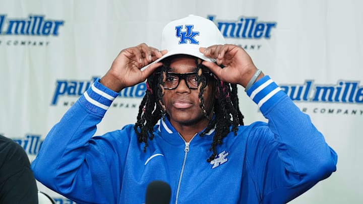 Jasper Johnson, a Lexington native and one of the top basketball players in the 2025 high school class, announces his commitment to the University of Kentucky during a ceremony at the Woodford County High School in Versailles, Ky. on Sep. 5, 2024.