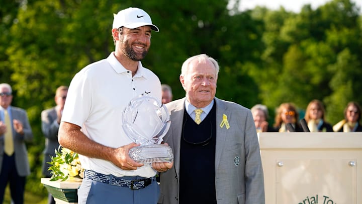 Scottie Scheffler joined Tiger Woods as the Memorial Tournament's only back-to-back champion. 