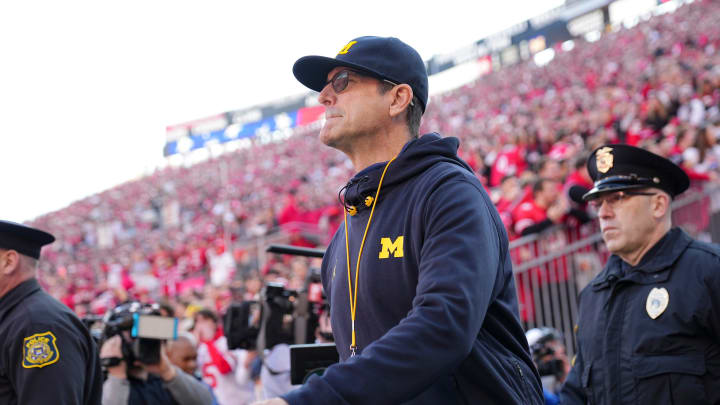 Nov 26, 2022; Columbus, Ohio, USA; pMichigan Wolverines head coach Jim Harbaugh walks onto the field rior to the NCAA football game against the Ohio State Buckeyes at Ohio Stadium. Mandatory Credit: Adam Cairns-The Columbus Dispatch

Ncaa Football Michigan Wolverines At Ohio State Buckeyes