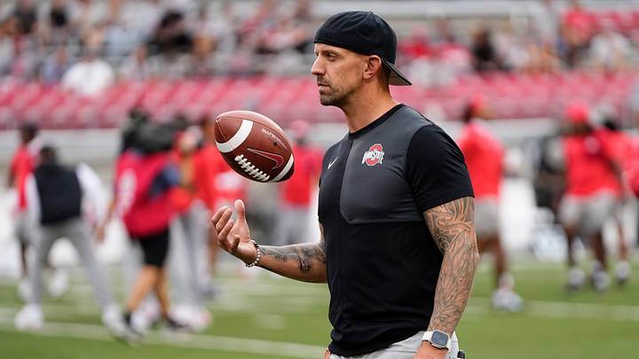 Ohio State Buckeyes linebackers coach James Laurinaitis warms up players prior to the NCAA football game against the Ohio Bobcats at Ohio Stadium on Sept. 13, 2025.