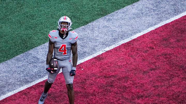 Oct 5, 2024; Columbus, Ohio, USA; Ohio State Buckeyes wide receiver Jeremiah Smith (4) celebrates after scoring a touchdown in the third quarter on Saturday.