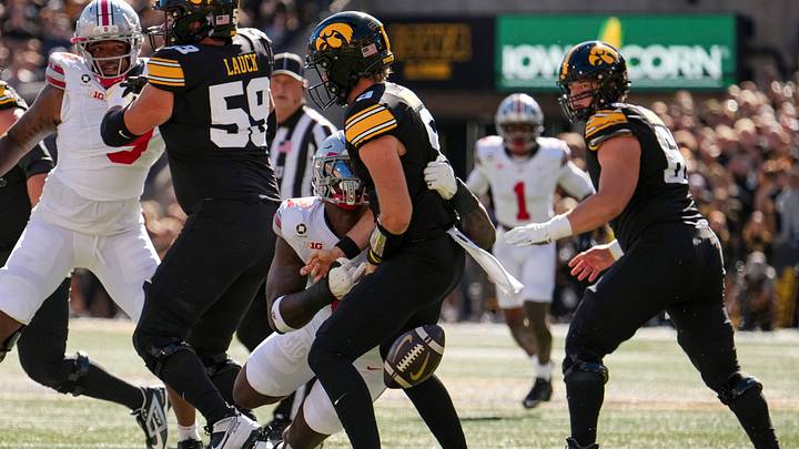 Ohio State Buckeyes defensive end Kenyatta Jackson Jr. (2) forces a sack fumble on Iowa Hawkeyes quarterback Hank Brown (9) during the NCAA football game at Kinnick Stadium in Iowa City on Oct. 3, 2026.