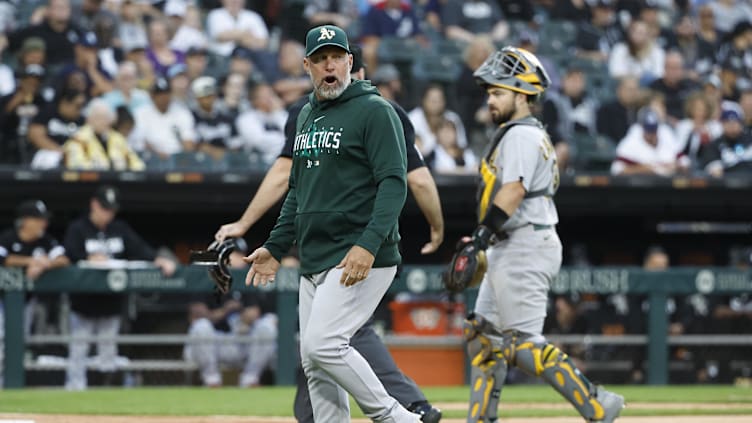 Aug 26, 2023; Chicago, Illinois, USA; Oakland Athletics manager Mark Kotsay (7) reacts during the