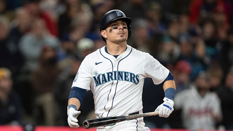 Apr 29, 2024; Seattle, Washington, USA; Seattle Mariners third baseman Luis Urias (16) walks off the field after an at-bat against the Atlanta Braves at T-Mobile Park. Mandatory Credit: Stephen Brashear-USA TODAY Sports