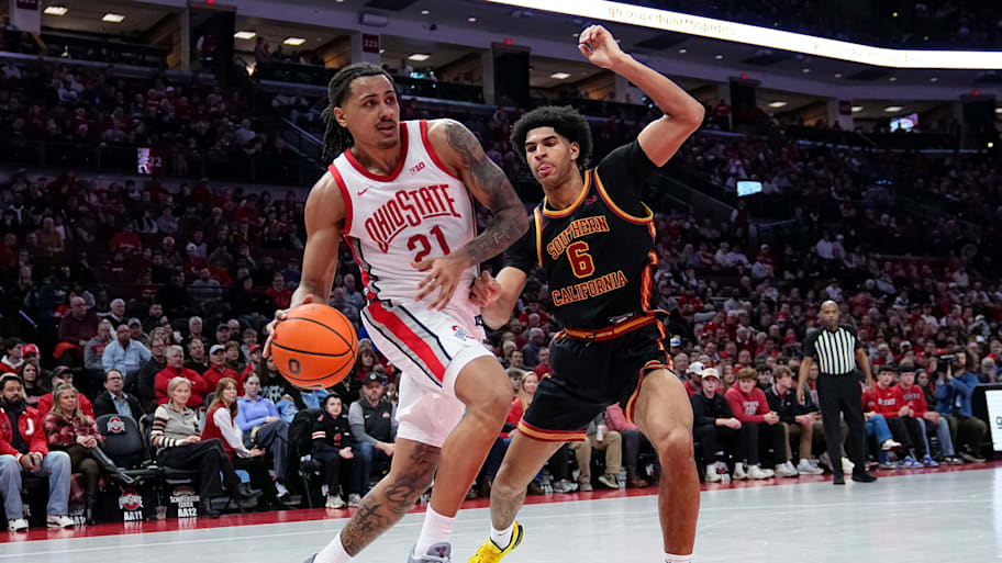 Jacob Cofie of USC guards Devin Royal of Ohio State.