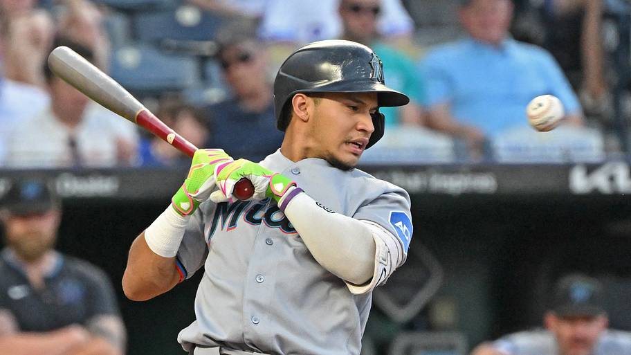 Miami Marlins shortstop Otto Lopez (6) backs away from an inside pitch
