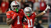 Sep 7, 2024; Columbus, Ohio, USA; Ohio State Buckeyes running back Quinshon Judkins (1) runs for a touchdown that was called back on a holding penalty during the first half of the NCAA football game against the Western Michigan Broncos at Ohio Stadium.