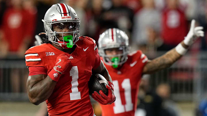 Sep 7, 2024; Columbus, Ohio, USA; Ohio State Buckeyes running back Quinshon Judkins (1) runs for a touchdown that was called back on a holding penalty during the first half of the NCAA football game against the Western Michigan Broncos at Ohio Stadium.