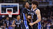 Nov 27, 2025; Chicago, Illinois, USA; Duke Blue Devils forward Cameron Boozer (12) celebrates with guard Isaiah Evans (3) during the second half at United Center. Mandatory Credit: Kamil Krzaczynski-Imagn Images