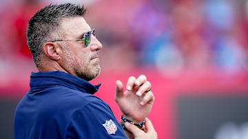 Tennessee Titans head coach Mike Vrabel watches his team warm up before a game against the Tampa Bay Buccaneers at Raymond James Stadium in Tampa, Fla., Sunday, Nov. 12, 2023.
