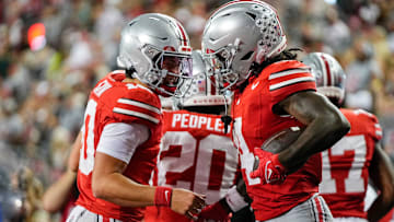 Ohio State Buckeyes quarterback Julian Sayin (10) celebrates a touchdown by wide receiver Jeremiah Smith (4) during the second half of the NCAA football game against the Ohio Bobcats at Ohio Stadium on Sept. 13, 2025. Ohio State won 37-9.